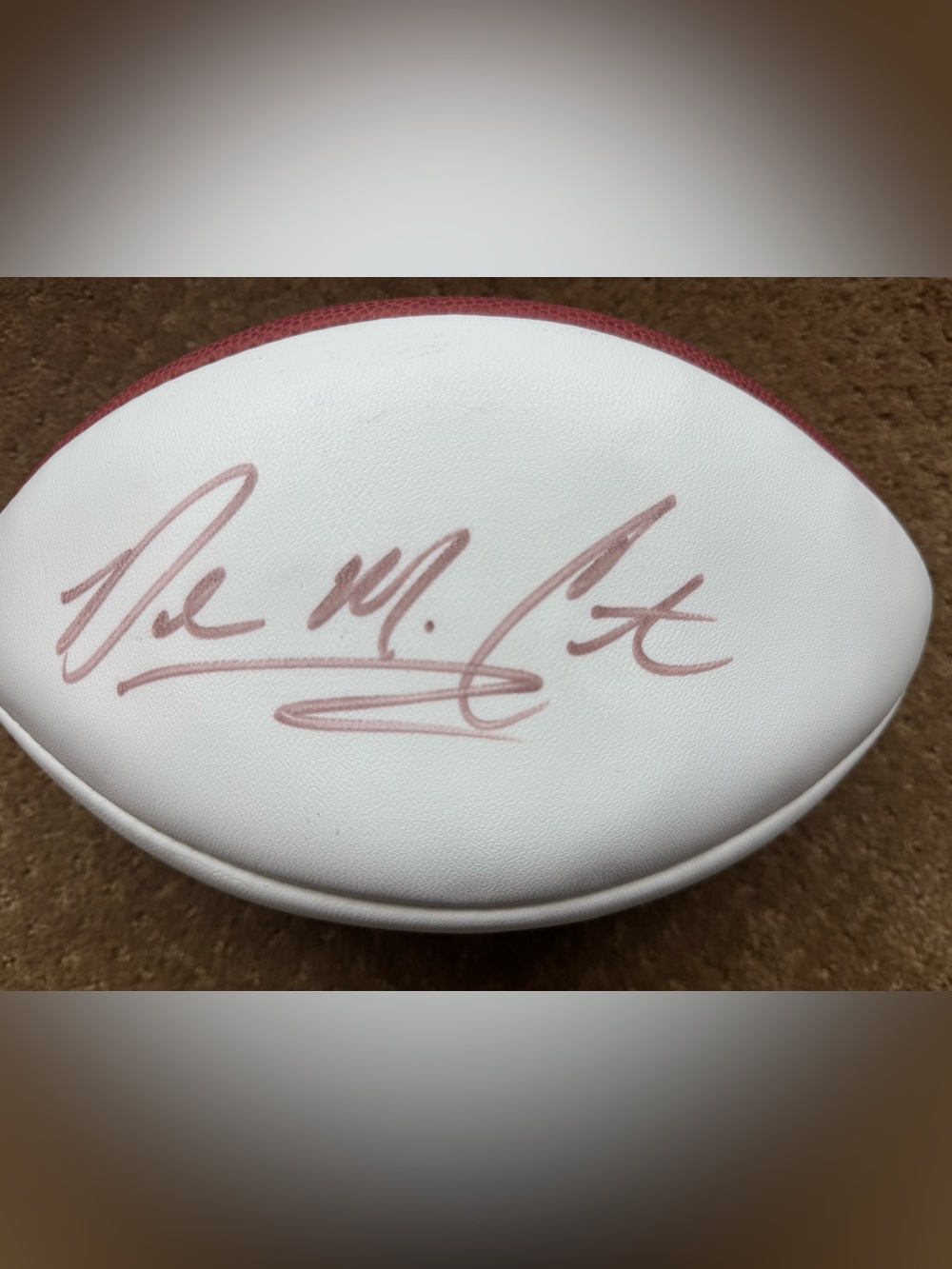 Devon McCourty signed football
